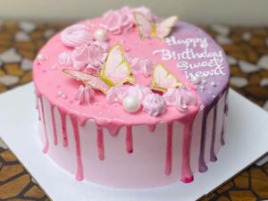 Vanilla Birthday Cake with Elegant Floral Design